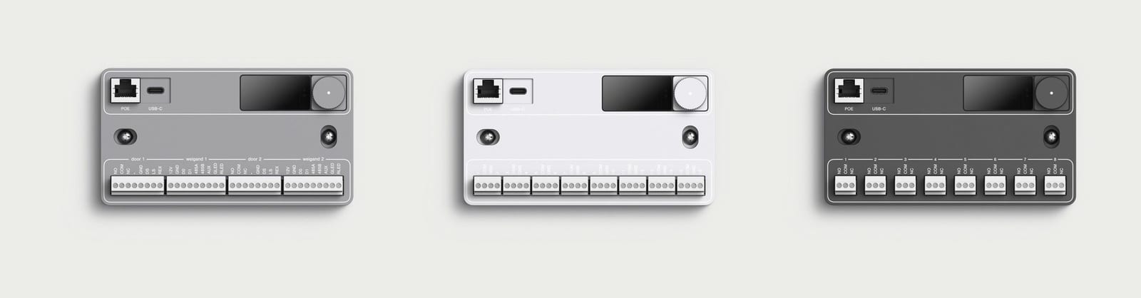 The Simple Things building controllers side by side: the access, input, and output modules, sharing one enclosure design with different terminal banks