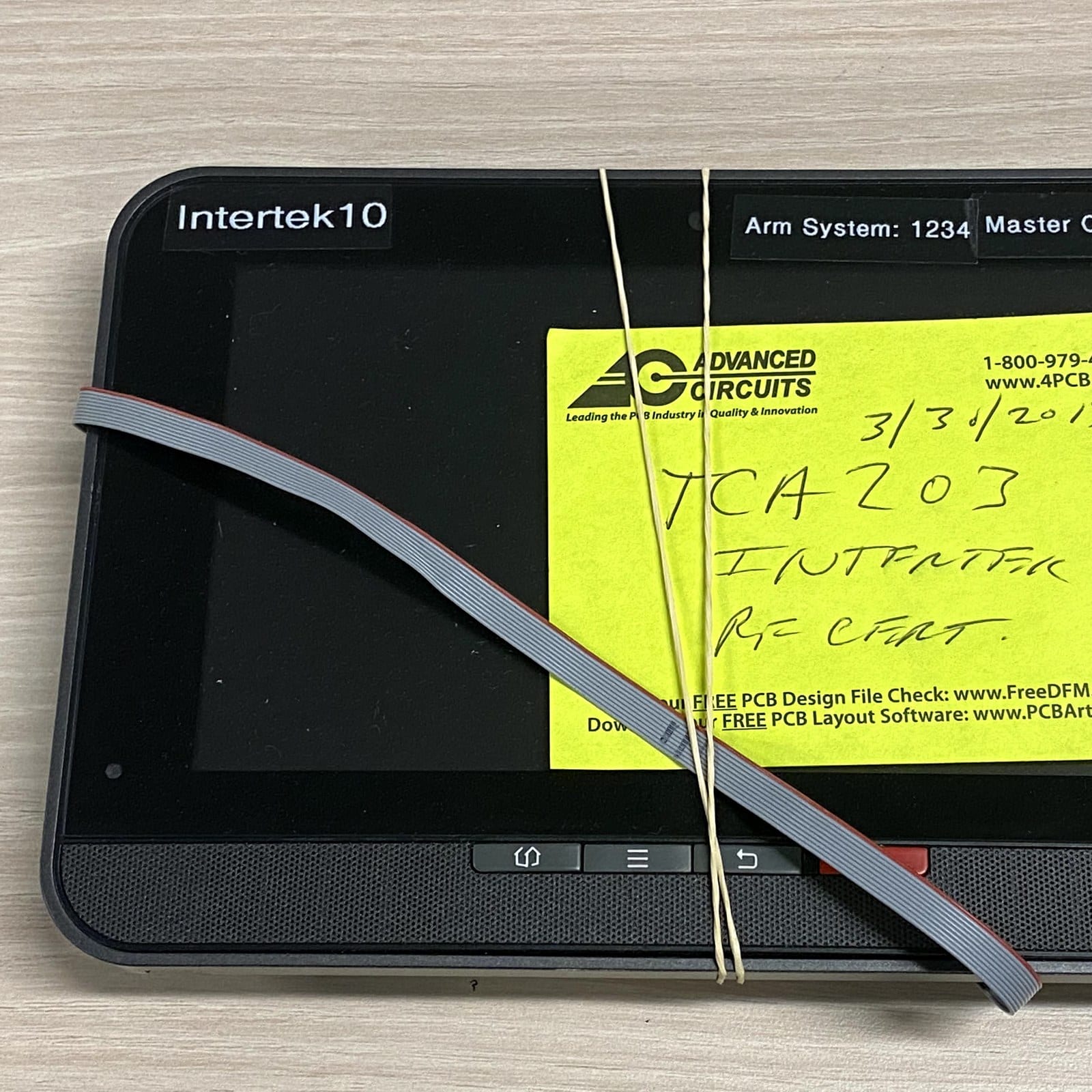 The Technicolor TCA203 touchscreen, tagged for Intertek RF certification in 2013