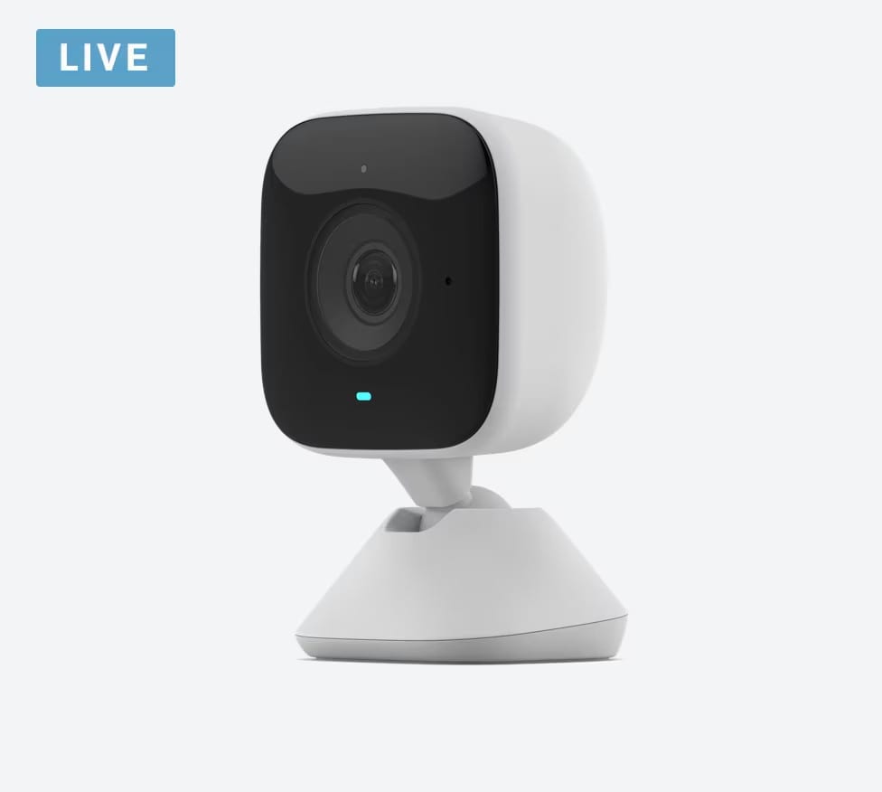 The Xfinity Indoor Camera on its stand with a live indicator, the 2023 Red Dot winner cited in the recognition row